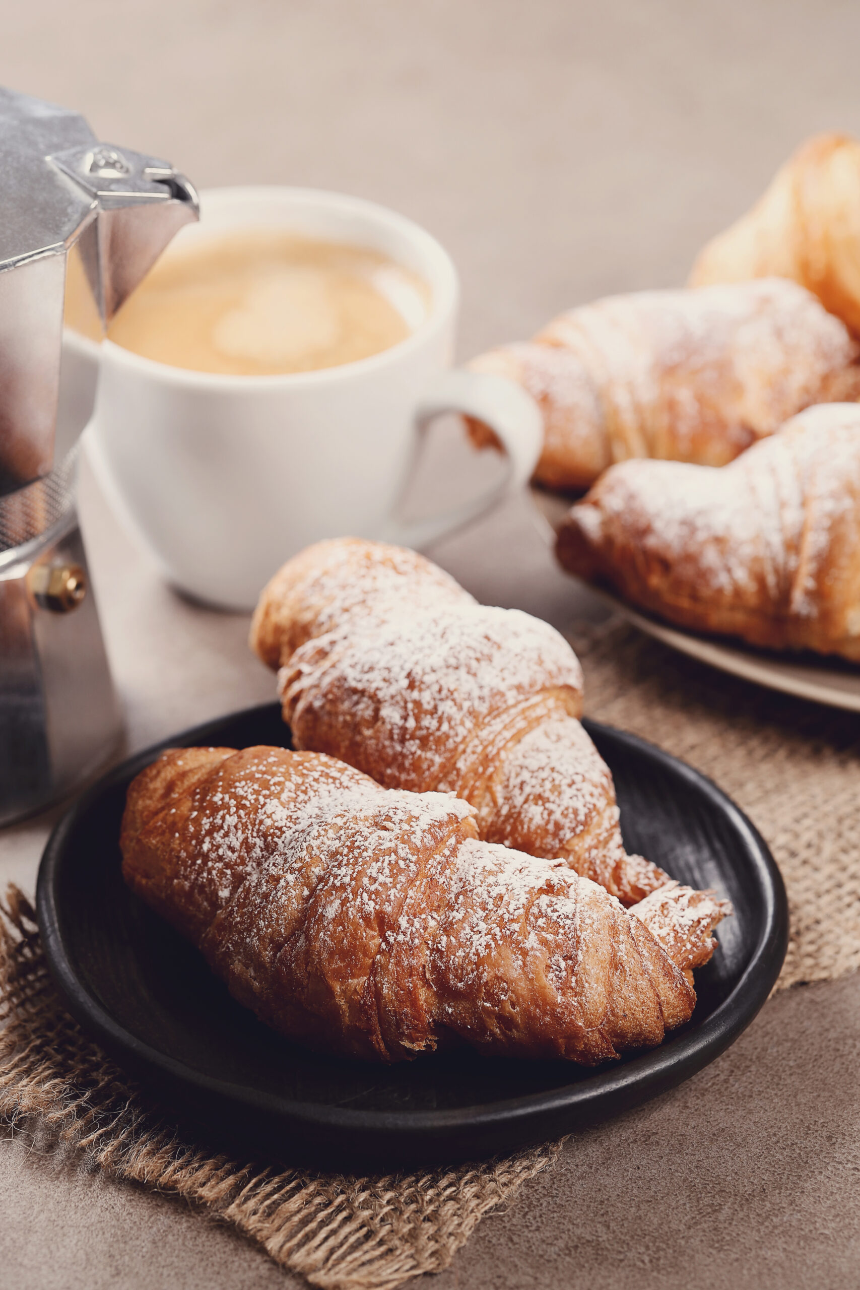 Breakfast. Delicious croissants on the table